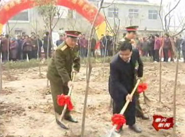 泰州軍分區援助 三陽村愛民路通車